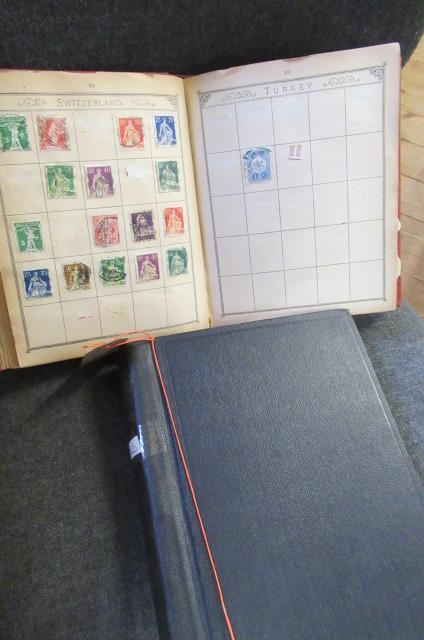TWO ALBUMS OF WORLD STAMPS Image