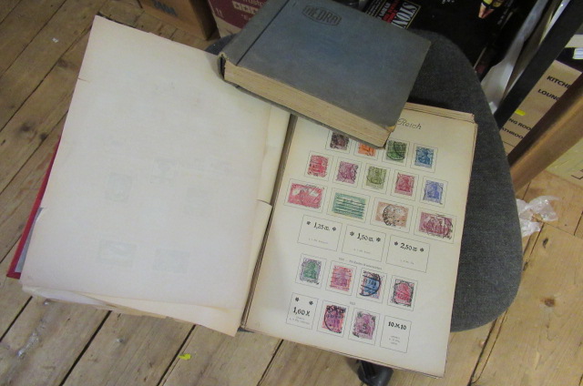 RED AND A BLUE ALBUM OF EUROPEAN STAMPS Image