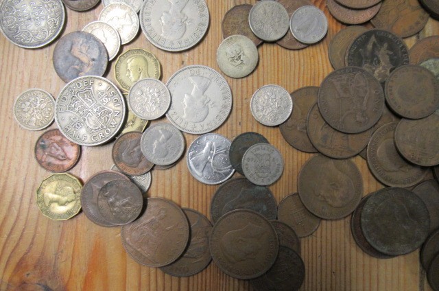 BAG OF COINS AND NOTES Image