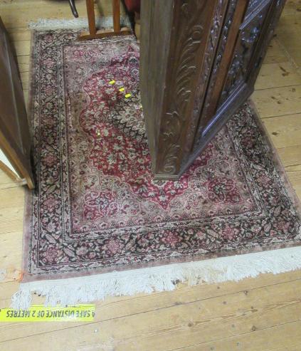 SMALL RED PATTERNED FRINGED RUG 4'6" BY 3'2" Image