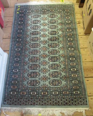 SMALL GREEN PATTERNED FRINGED RUG 4'6" BY 2'7" Image