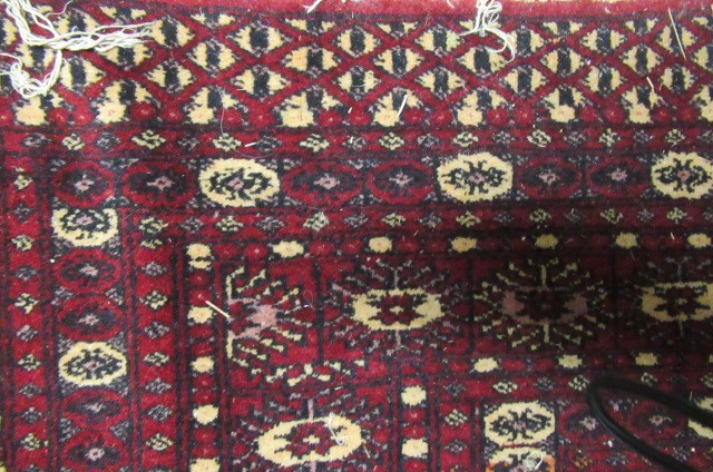 RED PATTERNED FRINGED RUG 5'9"  X  4' Image