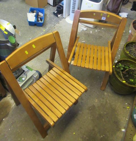 FOUR FOLDING WOODEN CHAIRS Image