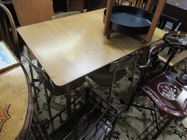 1950S EXTENDING TABLE AND FOUR TAVO FORMICA AND CHROME CHAIRS Image