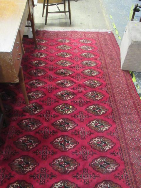 LARGE RED PATTERNED FRINGED RUG Image