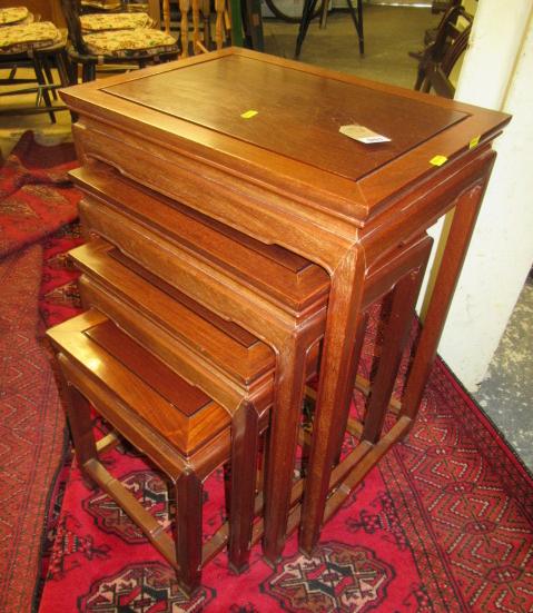 NEST OF FOUR CHINESE HARDWOOD TABLES Image