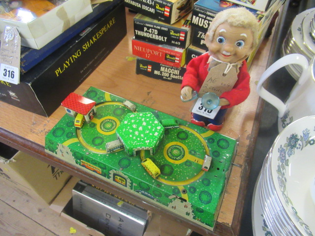 TWO CLOCKWORK TOYS Image