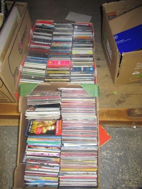 TWO BOXES OF CDS AND DVDS Image
