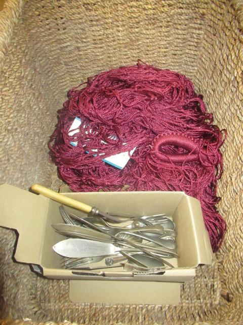 LOG BASKET OF CUTLERY AND A HAMMOCK Image
