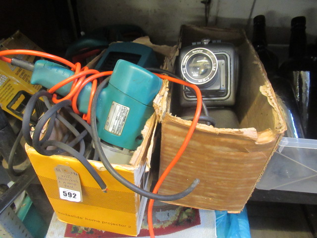 TWO RETRO PROJECTORS AND A HAND DRILL Image