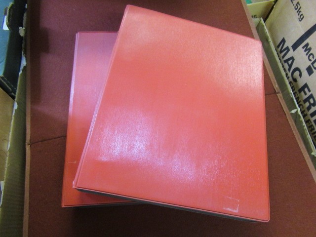 TWO RED ALBUMS OF GUERNSEY AND JERSEY MINT STAMPS Image