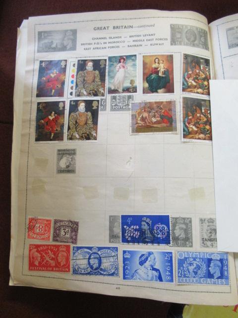 THREE ALBUMS OF WORLD STAMPS Image