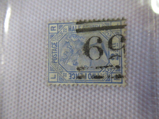 SMALL BLACK ALBUM OF VICTORIAN STAMPS Image