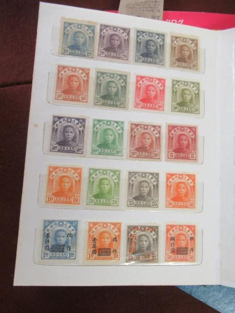 TWO SMALL STOCK BOOKS OF CHINESE STAMPS AND A 2004 CATALOGUE Image
