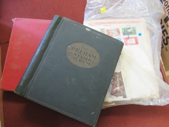 TWO STAMP ALBUMS AND A BAG OF STAMPS Image