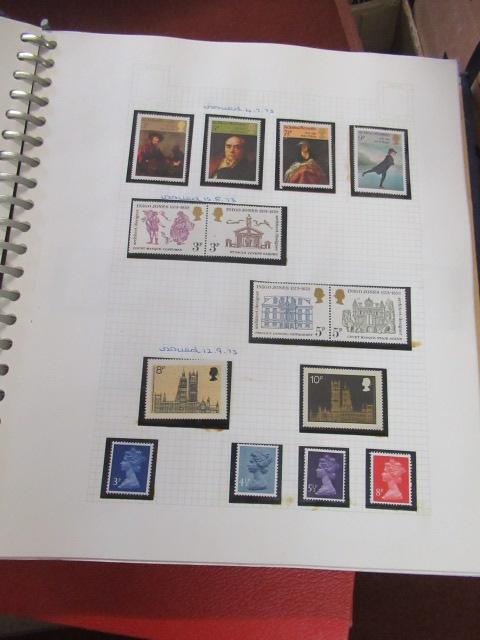 FOUR ALBUMS OF MINT AND USED WORLD STAMPS Image