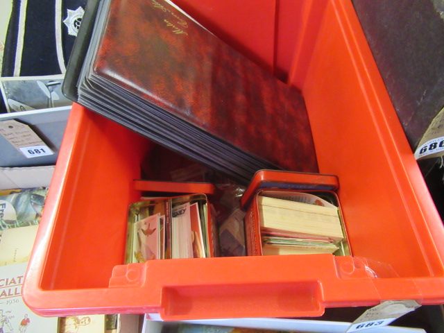 RED BOX OF FIRST DAY COVERS AND OXO TINS OF CIGARETTE CARDS Image