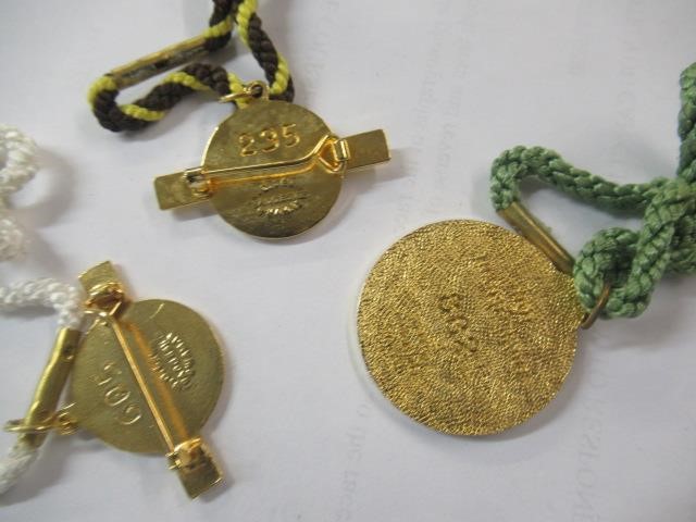 BOX OF COINS AND RACE COURSE BADGES Image