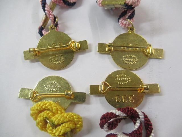 BOX OF COINS AND RACE COURSE BADGES Image