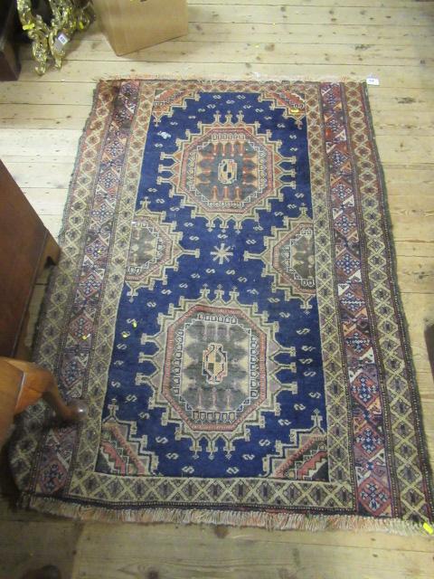 RED AND BLUE PATTERNED RUG Image