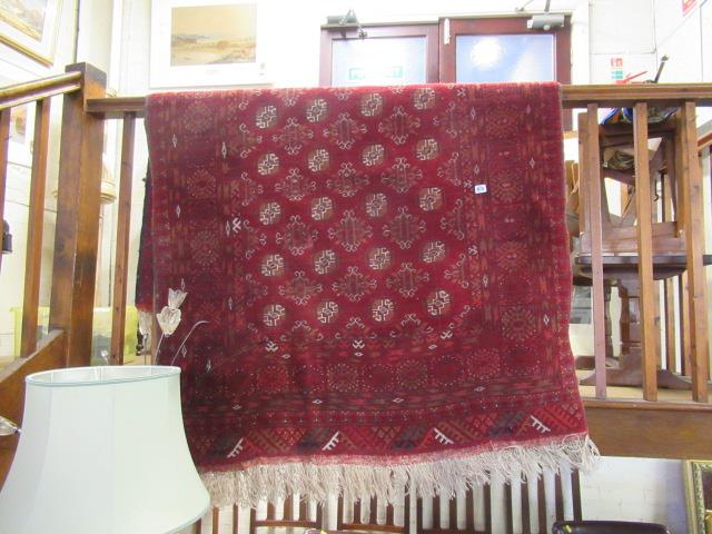 RED PATTERNED FRINGED RUG Image
