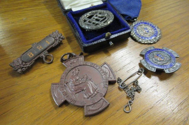 CASED MEDALLION AND OTHER SILVER BADGES ETC Image