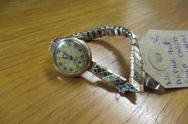 LADY'S 9CT GOLD CASED ALPHA WRISTWATCH Image