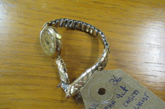 LADY'S 9CT GOLD CASED ALPHA WRISTWATCH Image