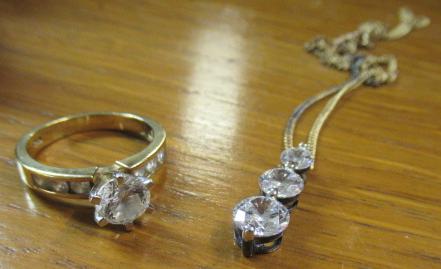 CHAIN AND GEMSTONE RING Image