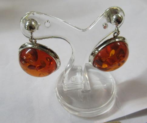 PAIR OF SILVER AND AMBER EARRINGS Image