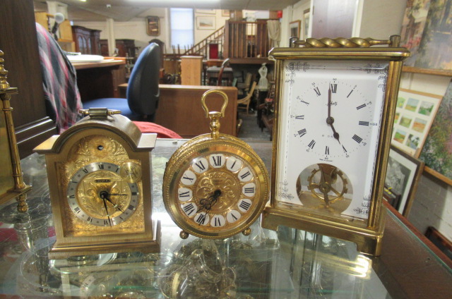 THREE CARRIAGE CLOCKS Image