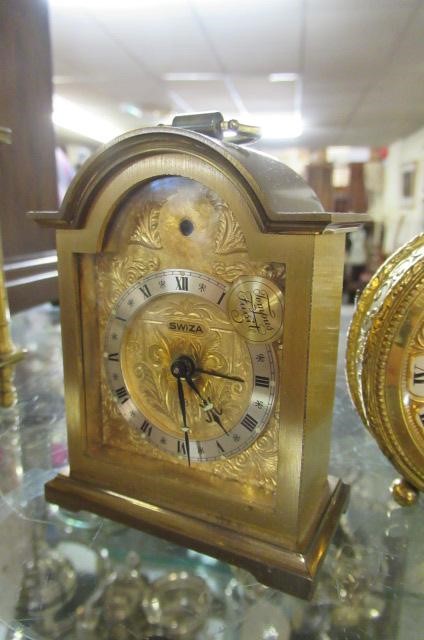 THREE CARRIAGE CLOCKS Image