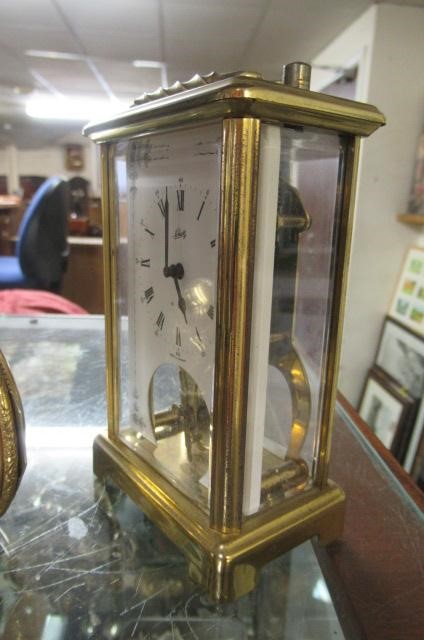 THREE CARRIAGE CLOCKS Image
