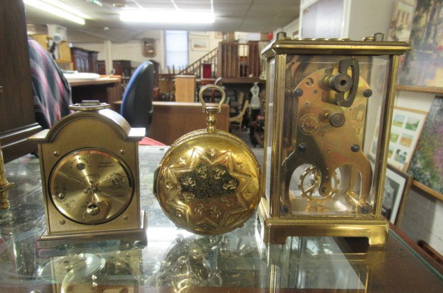 THREE CARRIAGE CLOCKS Image