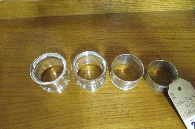 SILVER NAPKIN RING AND THREE OTHERS Image