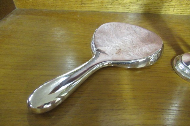 SILVER HAND MIRROR AND A STEM VASE Image