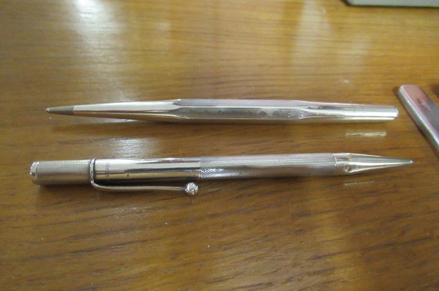TWO SILVER PENCILS   SILVER PENKNIFE AND A SILVER TORCH Image