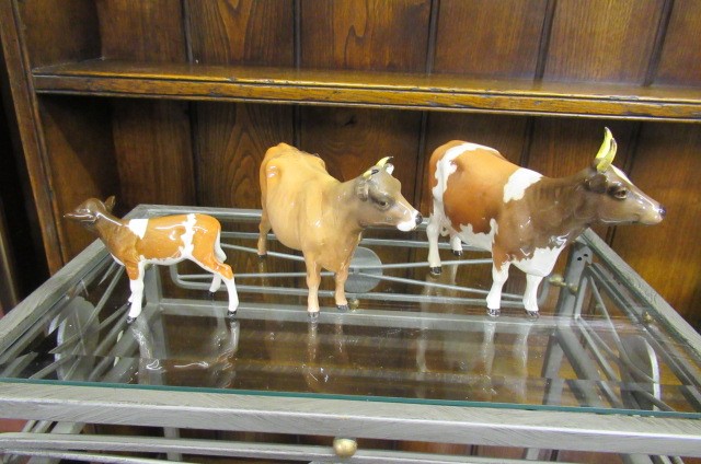 BESWICK COW AND CALF AND A JERSEY COW Image