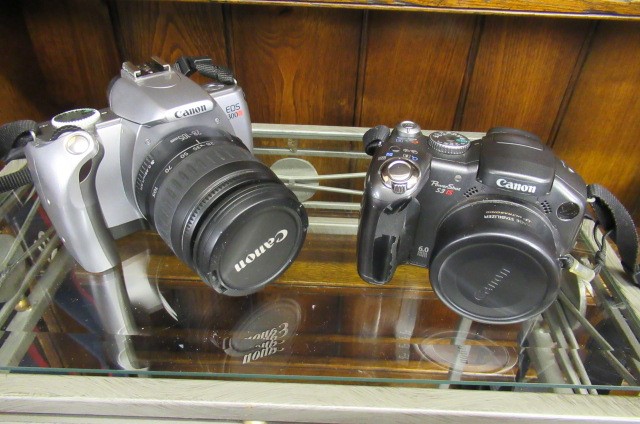TWO CANON CAMERAS Image