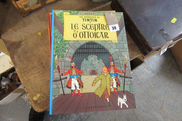 QUANTITY OF TINTIN ADVENTURE BOOKS INCLUDING TWO FRENCH HARDBACKS  Image