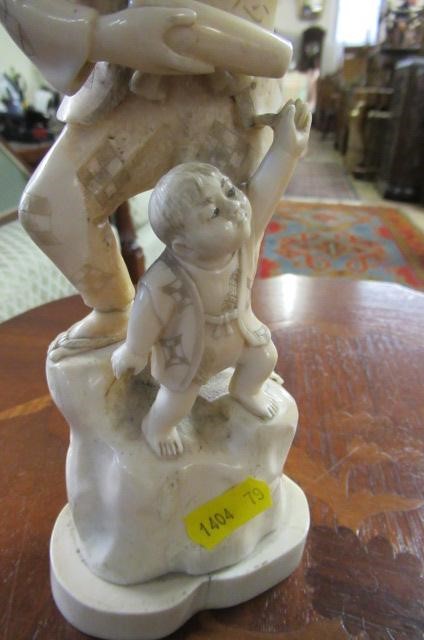 JAPANESE IVORY ONE PIECE OKIMONO WITH HARDWOOD STAND Image