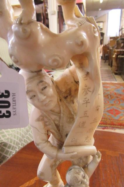JAPANESE IVORY ONE PIECE OKIMONO WITH HARDWOOD STAND Image