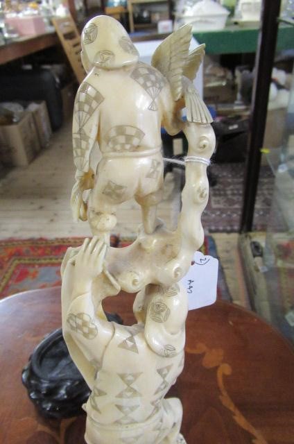 JAPANESE IVORY ONE PIECE OKIMONO WITH HARDWOOD STAND Image