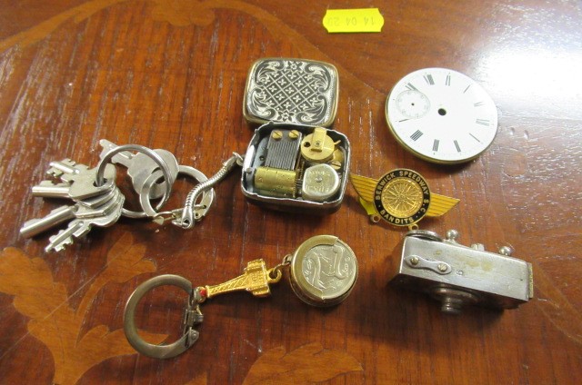 TIN OF COLLECTABLES INCLUDING SILVER COIN Image