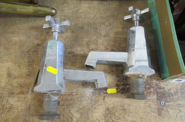 TWO LARGE TAPS Image