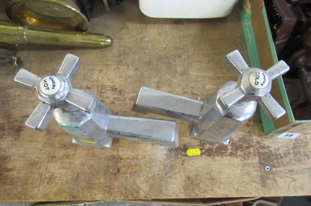 TWO LARGE TAPS Image