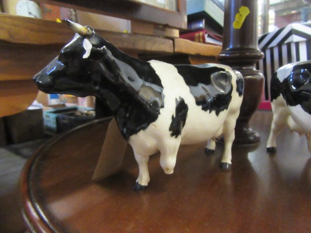 THREE BESWICK FRIESIAN COWS Image