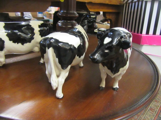 THREE BESWICK FRIESIAN COWS Image
