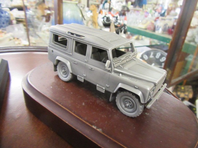 TWO LANDROVER MODELS ON PLINTHS Image