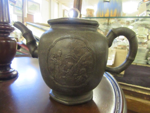 CHINA CUP AND SAUCER AND CHINESE TEAPOT Image